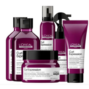 L'Oréal Professionnel Curl Expression: Hidratación y Definición para Cabellos Rizados Gama de productos L'Oréal Professionnel Curl Expression, formulados con glicerina, urea y semilla de hibisco para hidratar y definir rizos y ondas. Incluye champú, mascarilla, crema, mousse y spray en envases morados con detalles negros y blancos, diseñados para potenciar la forma natural del cabello rizado.